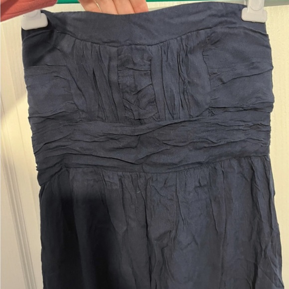 Navy blue dress size L
Short at the front long hanging at the back - Picture 3 of 5